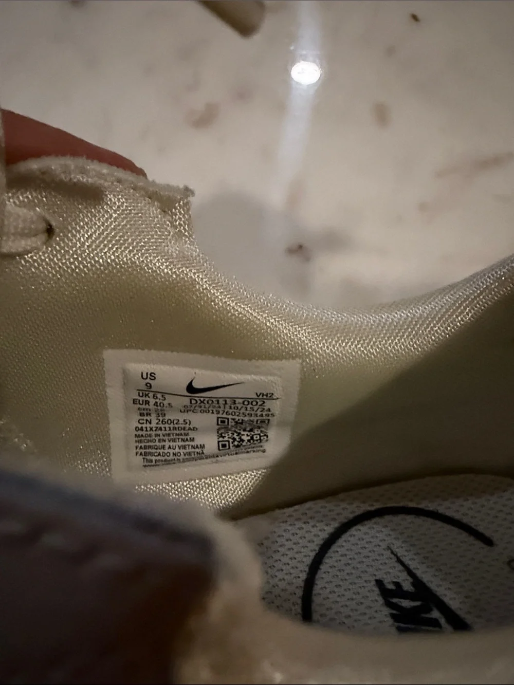 Nike Cream/White Sneakers with Metallic Swoosh